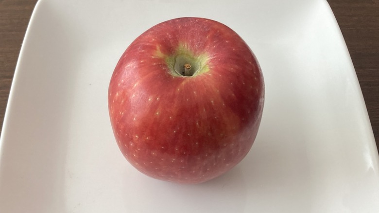 white plate with Cosmic Crisp apple