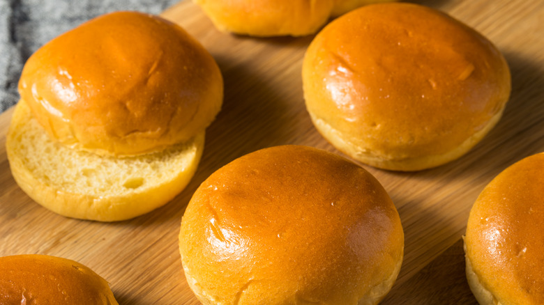 Brioche buns on wooden board