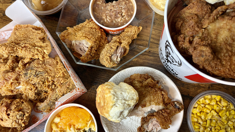 Orders of Popeyes Signature Chicken and KFC Original Recipe fried chicken, and side dishes from each restaurant.