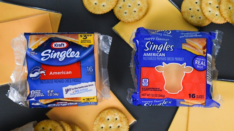 packages of Kraft American cheese and Happy Farms American cheese from Aldi