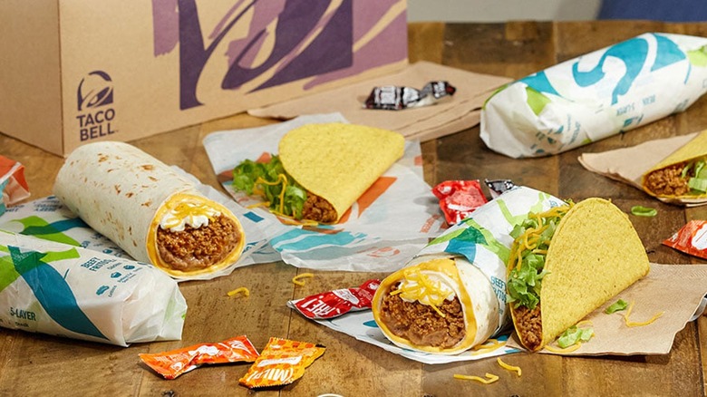 table with Taco Bell burritos and tacos