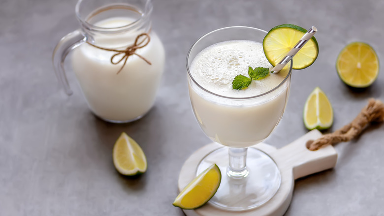 Whipped lemonade in glass jar and pitcher