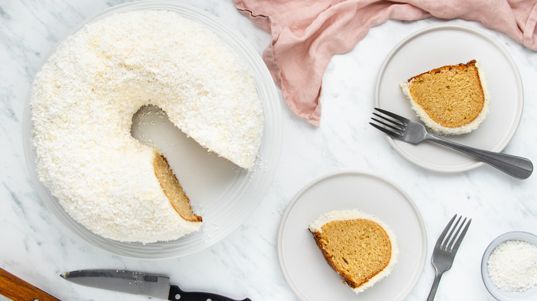 white chocolate coconut bundt cake on plates 