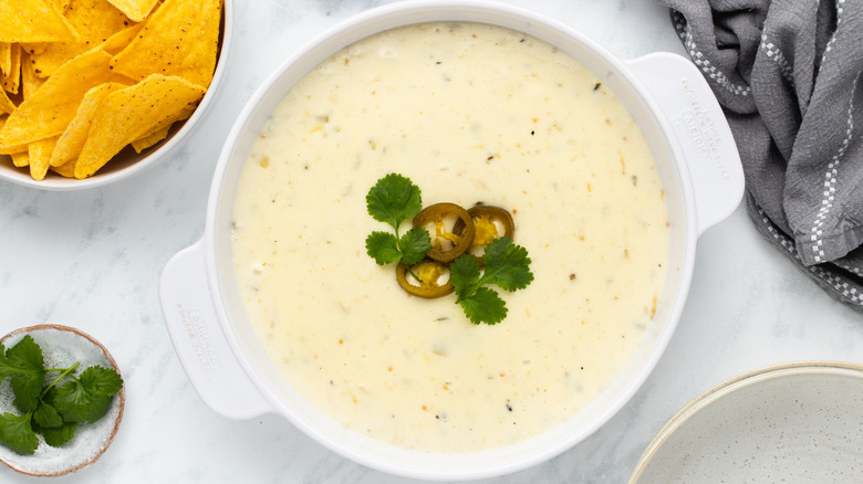 large bowl of white queso