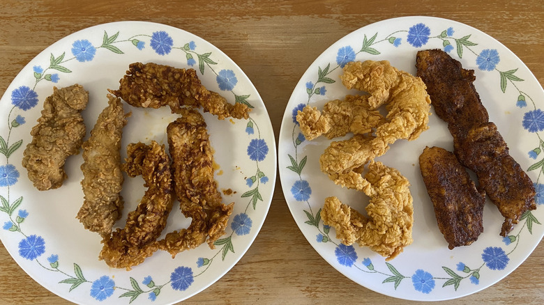 KFC and Popeyes tenders on separate plates