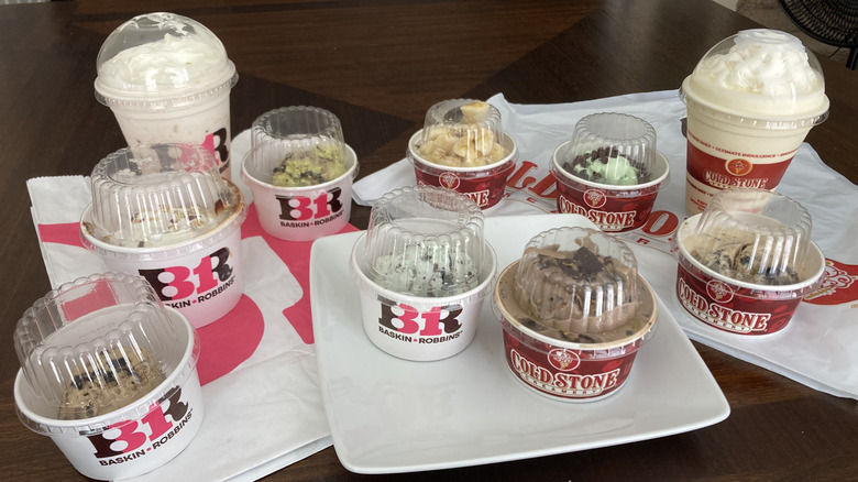 Baskin Robbins and Cold Stone spread of ice cream cups and malts in to-go cups