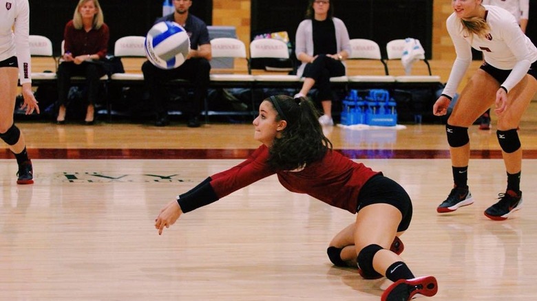Isabelle Tashima playing for Harvard University's Women's Volleyball team