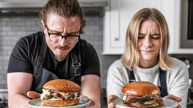 Joshua and Kate Weissman with burgers