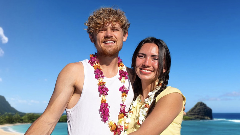 Ryan Trahan and Haley Pham posing on the beach
