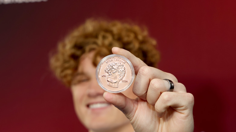 Ryan Trahan with Penny Challenge coin