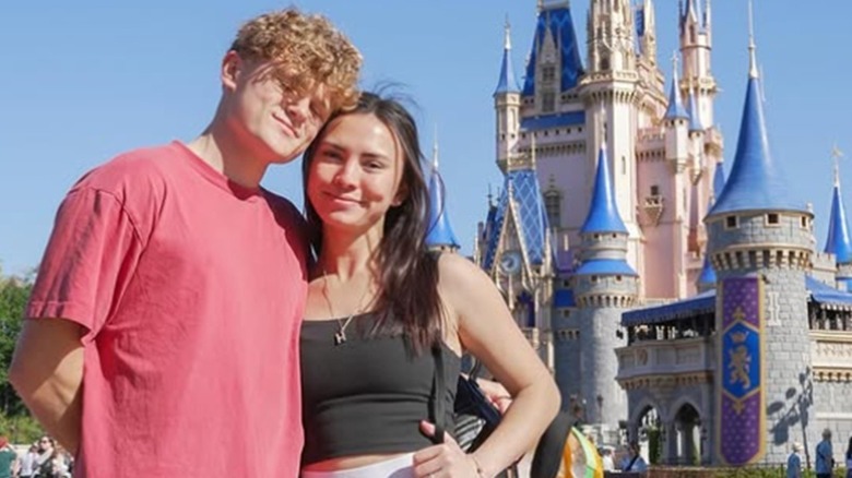 Ryan Trahan and Haley Pham in front of Cinderella Castle at Disney World