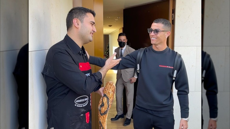 CZN Burak, also known as Burak Ozdemir, greeting Cristiano Ronaldo