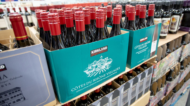 Cases of Kirkland Signature Côtes du Rhône in Costco wine section.