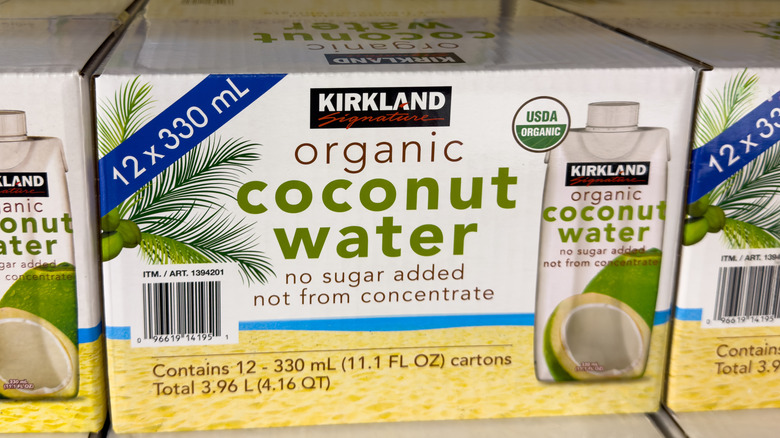 Box of Kirkland Signature organic coconut water on shelf