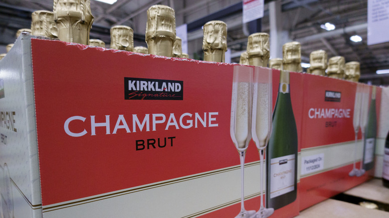 Box of Kirkland Signature Champagne Brut bottles in Costco.