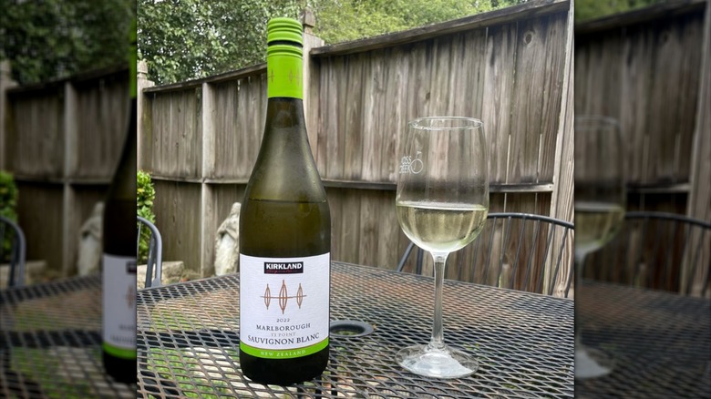Costco's Kirkland Signature Marlborough sauvignon blanc on an outdoor patio table