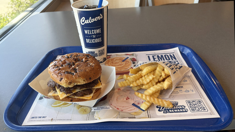 Culver's burger, fries, and drink on tray