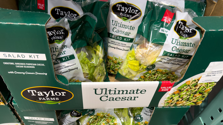 A box of Taylor Farms bagged Ultimate Caesar salad kit at Costco
