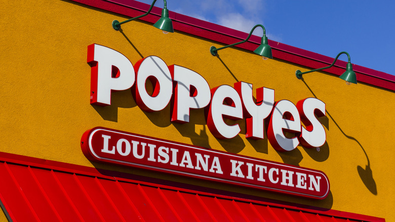 An exterior shot of a Popeyes restaurant