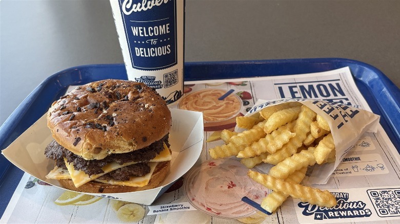 Culver's burger, fries and drink on a tray