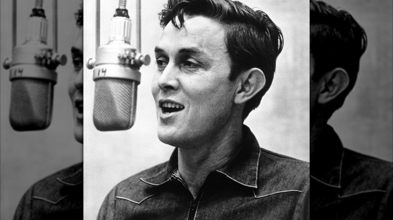 Black and white photo of Jimmy Dean in the recording studio, circa 1957