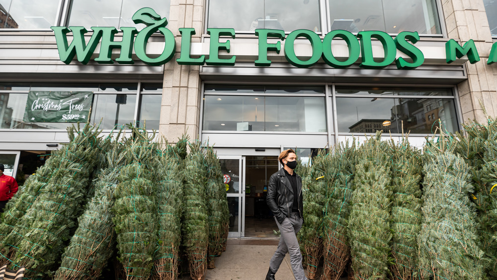 Christmas trees outside Whole Foods