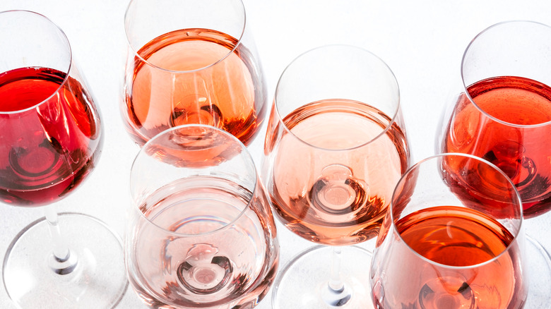 glasses of rose wine in various colors