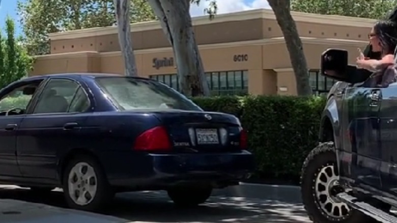 Woman arguing with line-jumper at In-N-Out