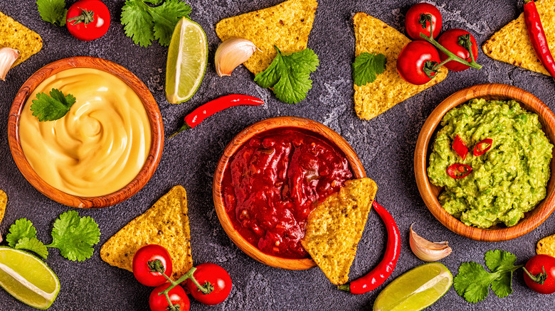 tortilla chips and dip with vegetables