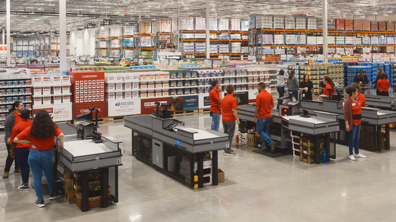 Costco employees working checkout registers