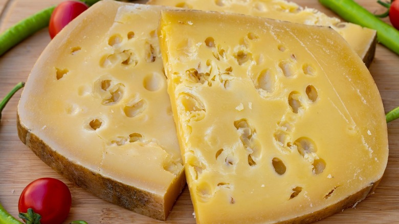 gruyere cheese with slight holes in it