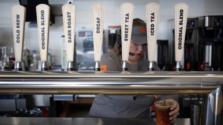 row of Dunkin' cold brew taps