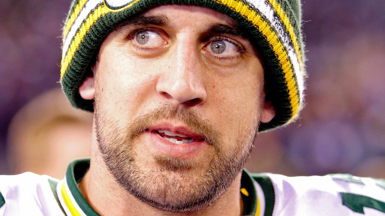 Aaron Rodgers in a Packers beanie