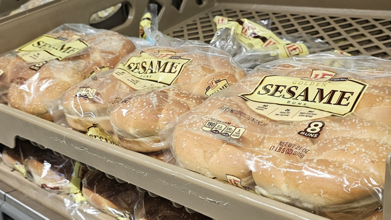 Golden sesame hamburger buns on an Aldi shelf