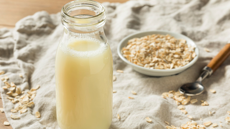 bottled oat milk with oats