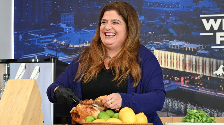 Alex Guarnaschelli performing a cooking demonstration at the NYC Wine & Food Festival.