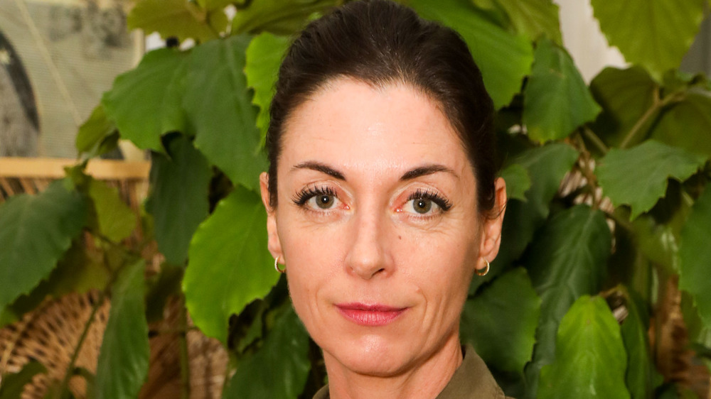 Mary McCartney in front of plants