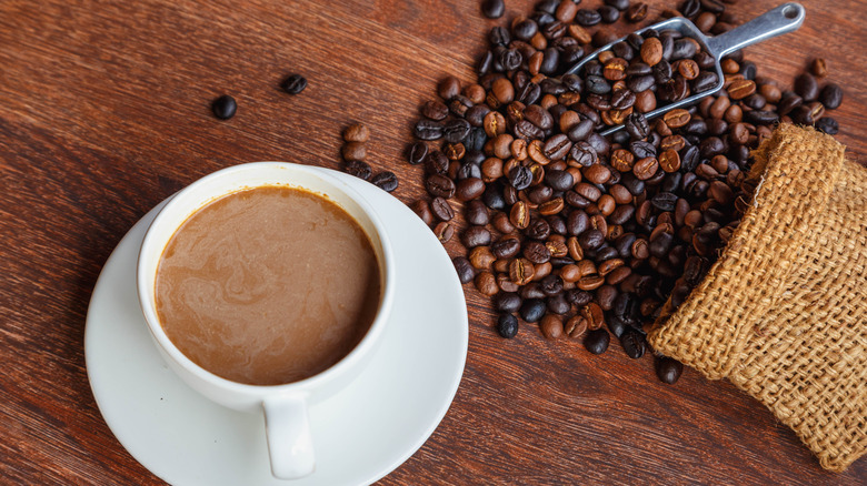 Cup of coffee and beans