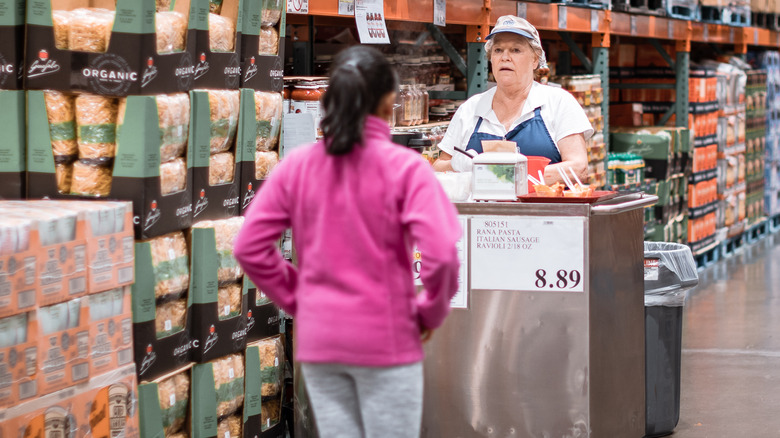 Woman queuing for Costco samples
