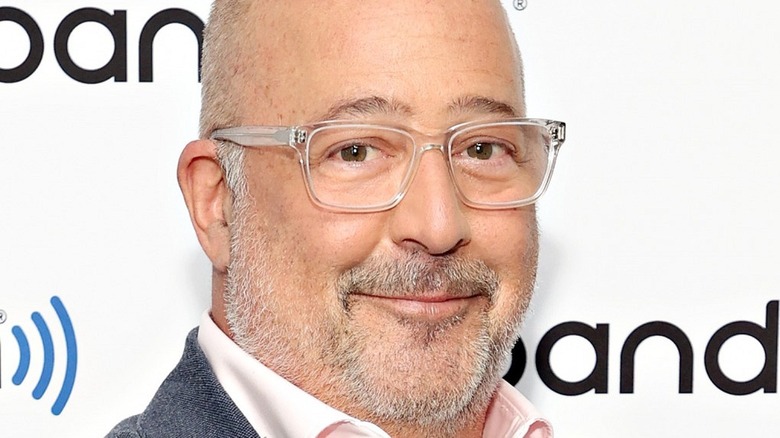 Andrew Zimmern smiling