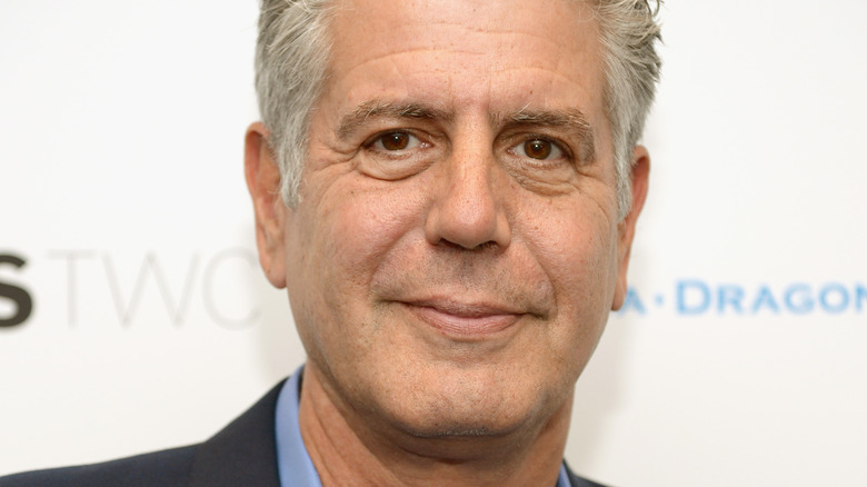 Anthony Bourdain slight smile