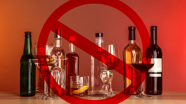 Alcohol bottles and drinks with a ban sign