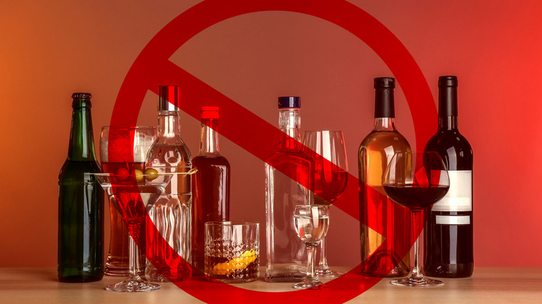Alcohol bottles and drinks with a ban sign