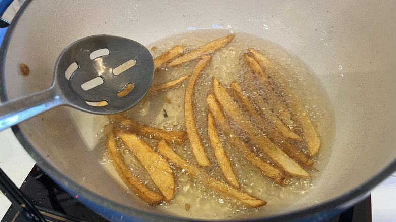 French fries cooking in beef tallow