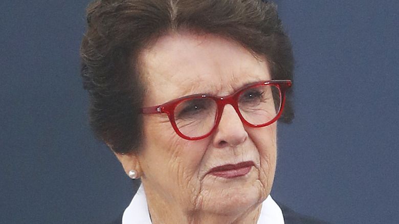 Billie Jean King wearing red glasses