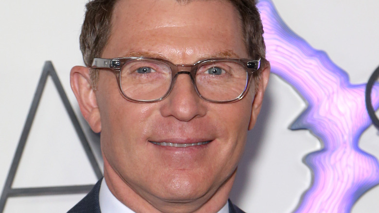 Bobby Flay in round glasses