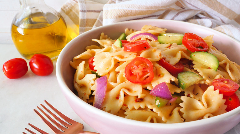 Pasta salad with olive oil and chopped vegetables