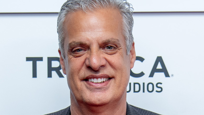 Chef Eric Ripert smiling on red carpet