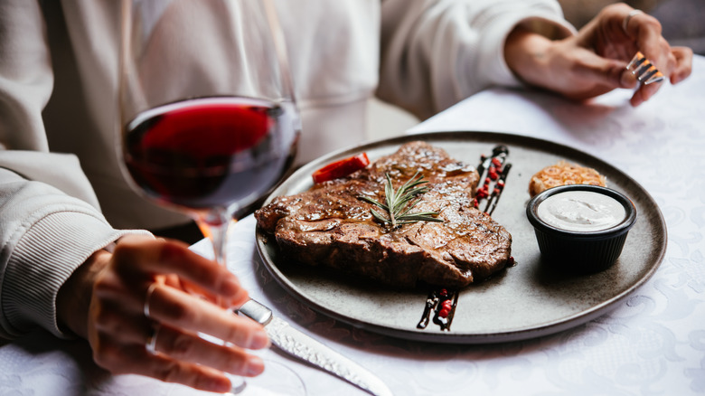 Steak and red wine at restaurant