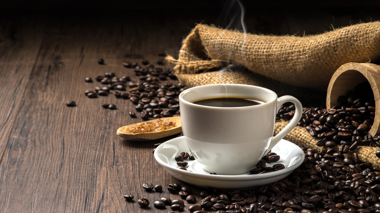 cup of coffee and coffee beans